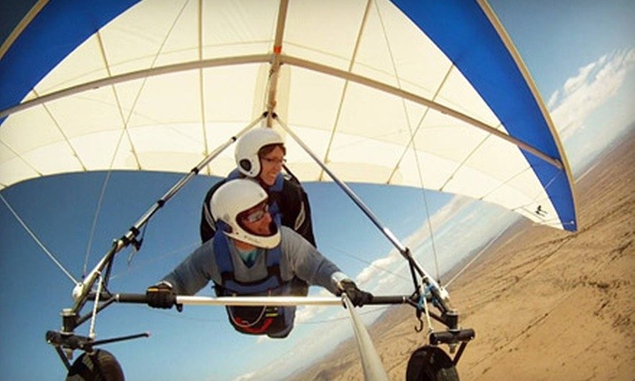 people hang gliding