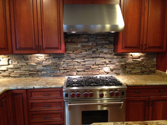 eclectic kitchen with stone backsplash