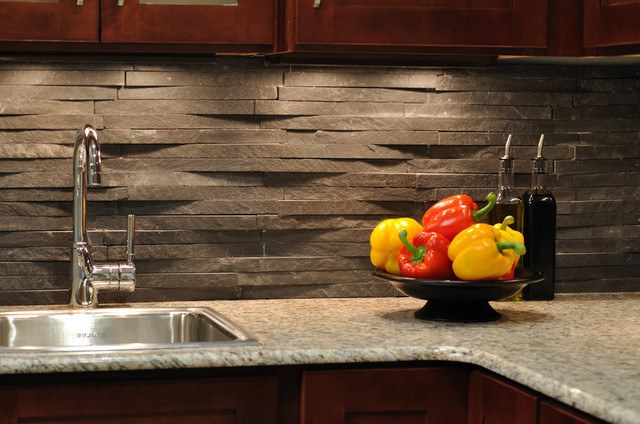 modern kitchen with black stone backsplash