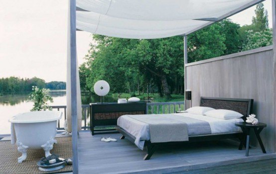 outdoor bedroom with bathtub