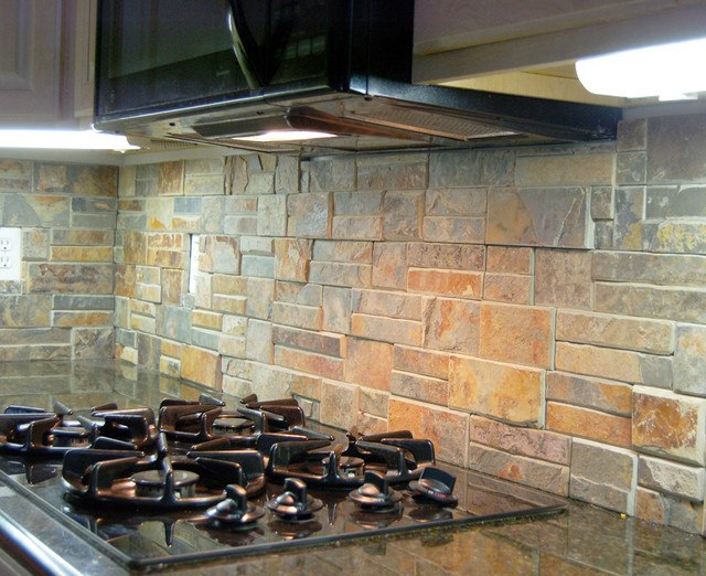 traditional kitchen with stone backsplash