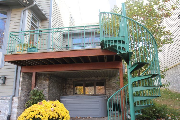 green metal spiral staircase