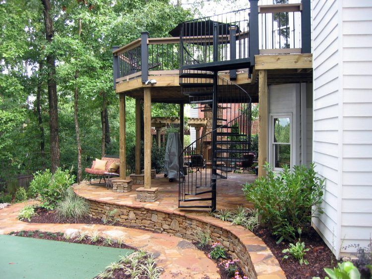 beautiful backyard spiral staircase