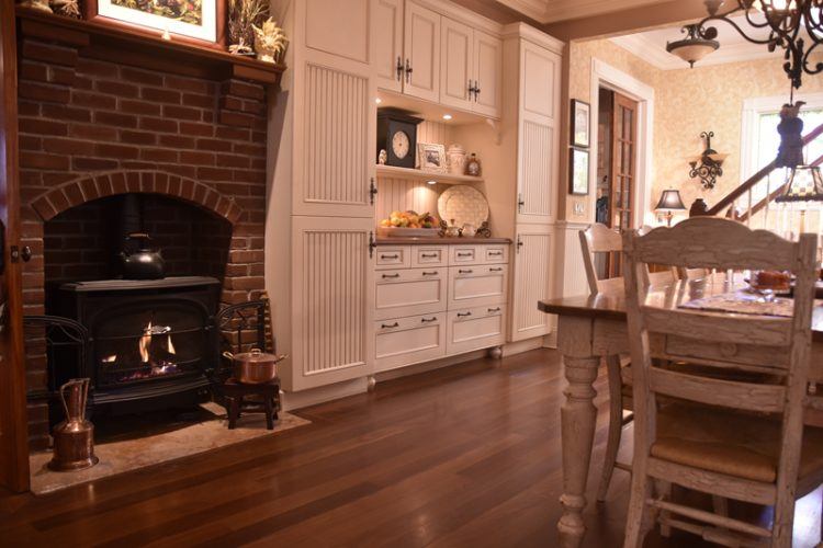 kitchen with wood floor and fireplace