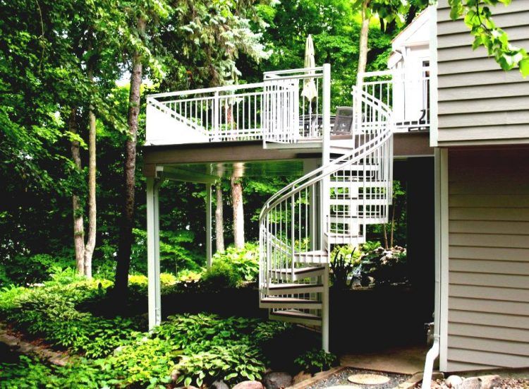 deck with white spiral staircase