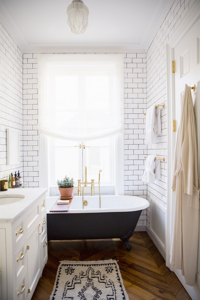 small bathroom with black tub