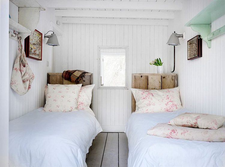 twin beds with wooden headboard