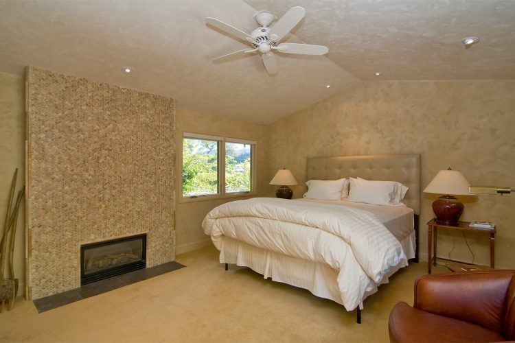 simple bedroom with ceiling fan