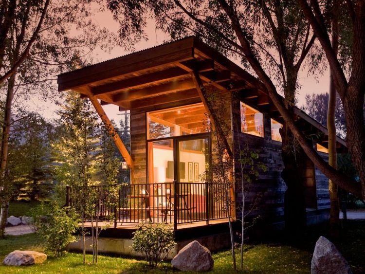 wooden tiny house with porch