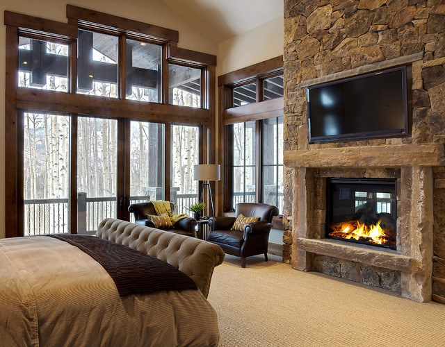 Bedroom With Built-In Fireplace