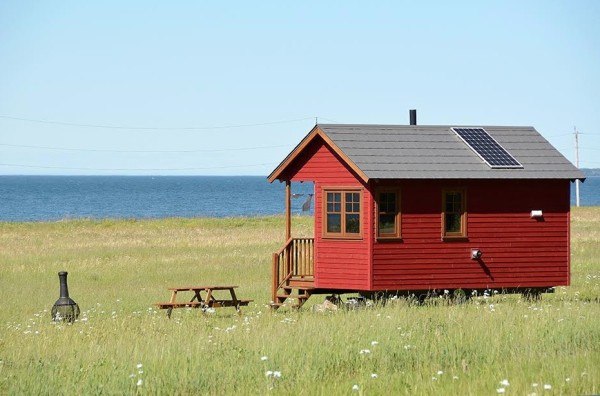 red tiny home off the grid