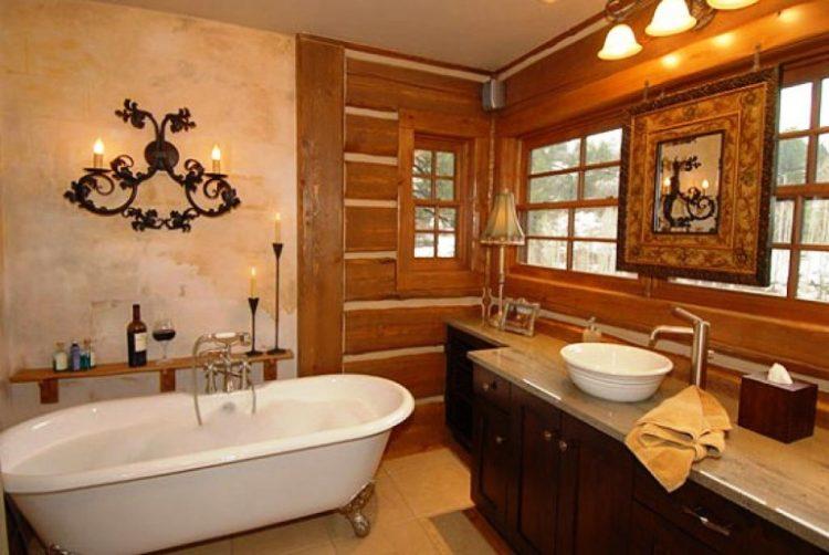 bathroom with white tub and sink