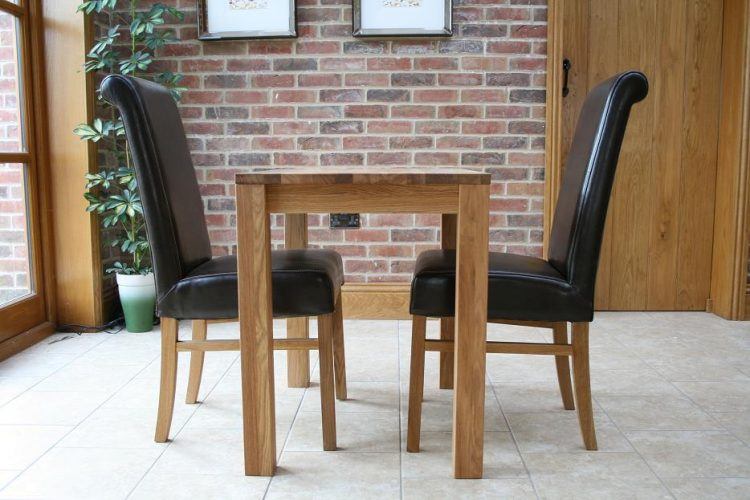 small oak dining table with leather seats