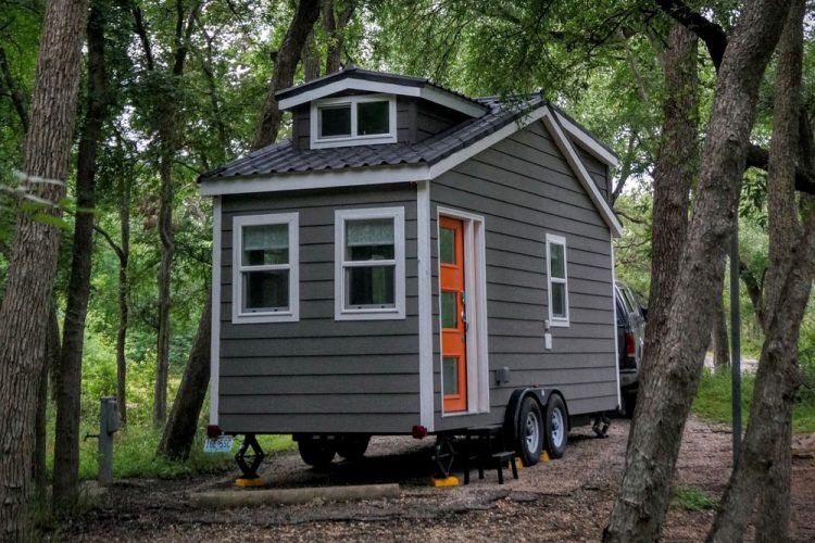 tiny gray two story house