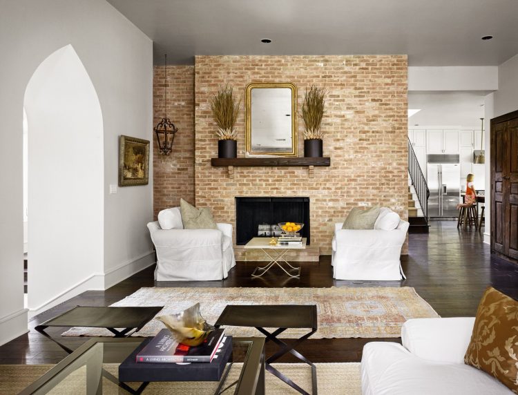 living room with nice brick accent wall