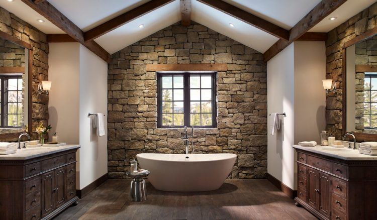 stone rustic bathroom with freestanding tub