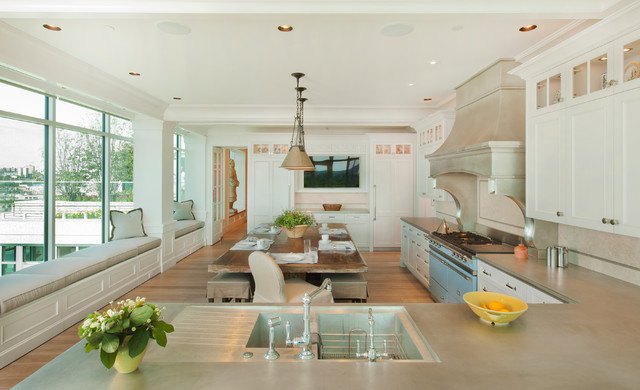 beautiful bright kitchen with window seat