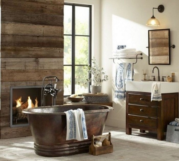 bathroom with fireplace and freestanding tub