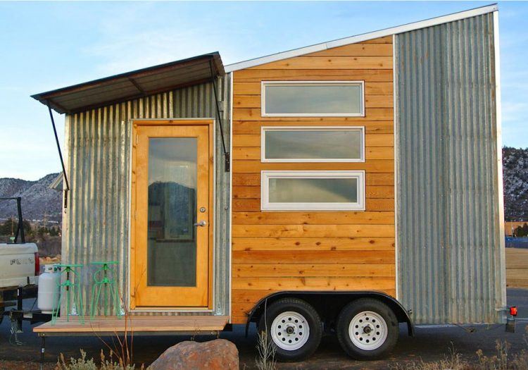 wood and metal tiny house on wheels