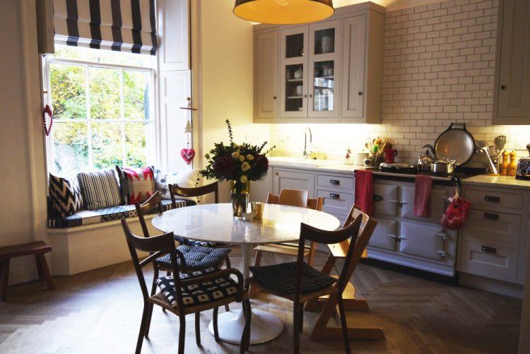 simple kitchen design with window seat