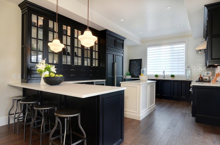 Black and white kitchen with tray ceiling accented 