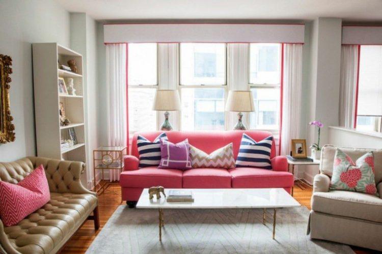 simple living room with pink couch