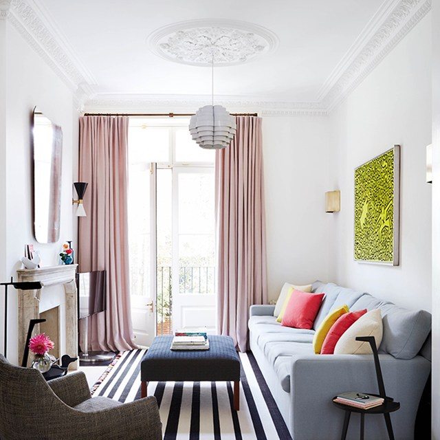 living room with black and white carpet