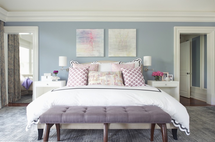 bedroom with purple foot stool