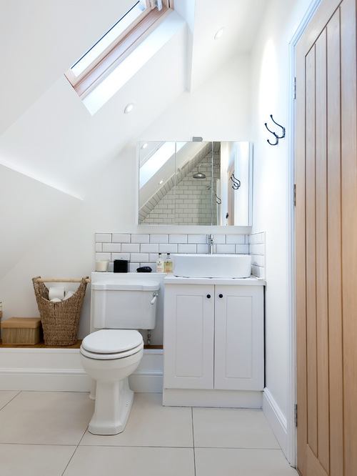 small bathroom with slanted ceiling