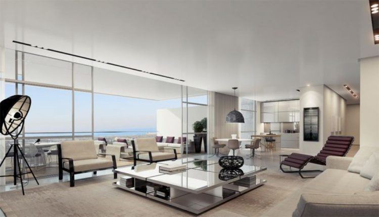 contemporary living room with stunning glass coffee table