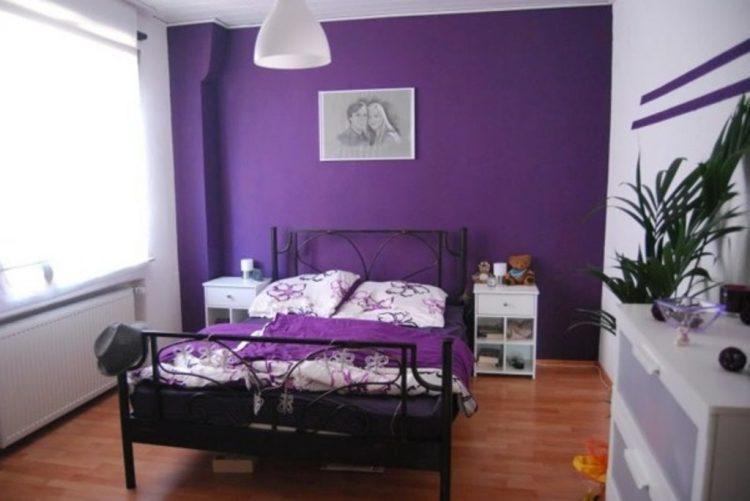 dark purple accent wall in bedroom