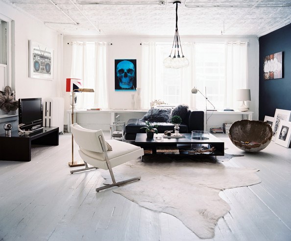 living room with white bear skin sofa