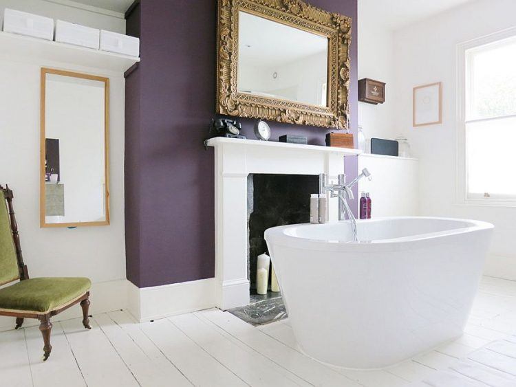 bathroom with purple accent wall