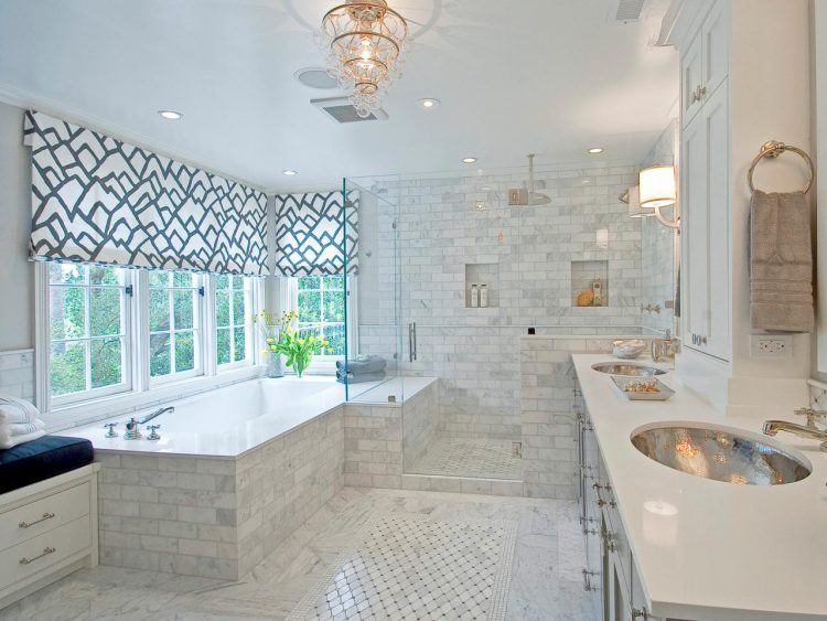 lavish bathroom with gold chandelier 