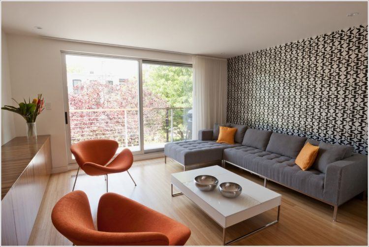 living room with orange accent chairs