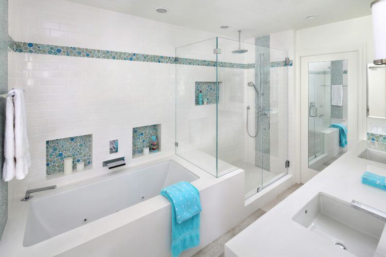 white shower with blue and green accent tiles