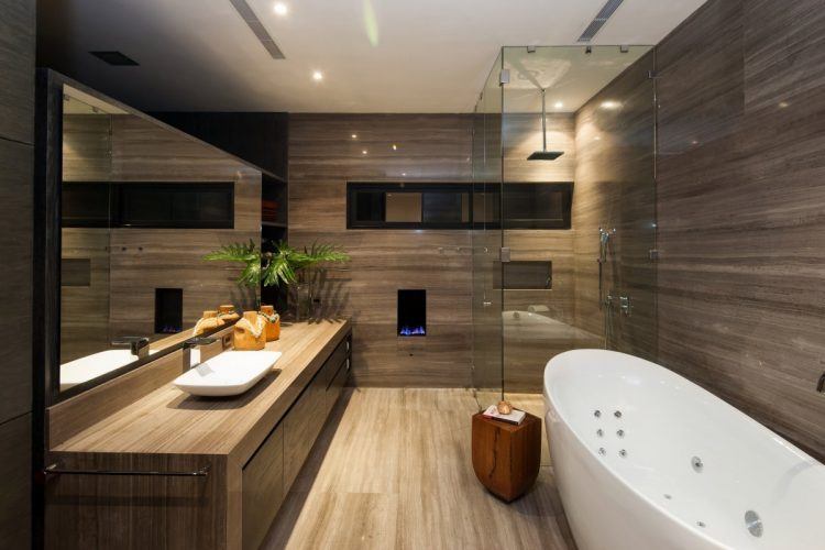 marble bathroom with glass shower in mexico 