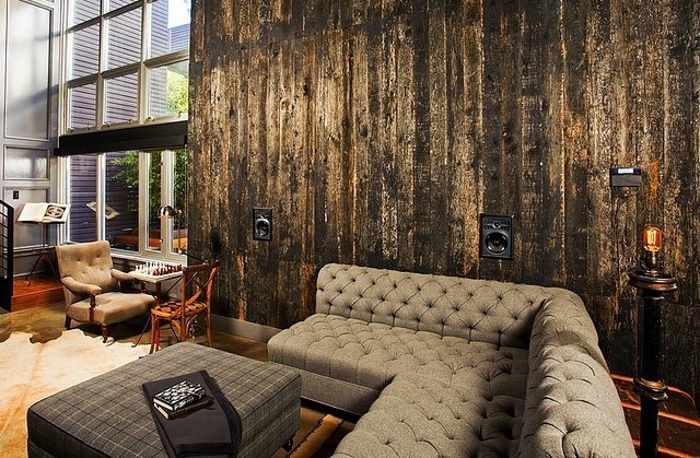 living room with dark wooden wall