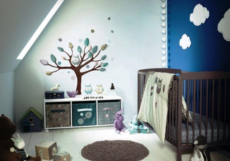 modern nursery with blue and white walls