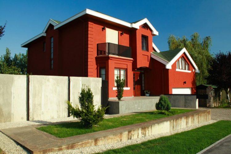 painted house with red design