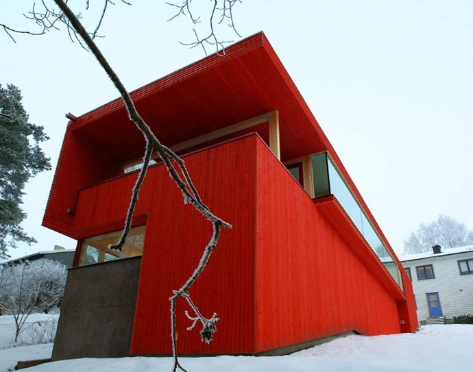 red house on a hill