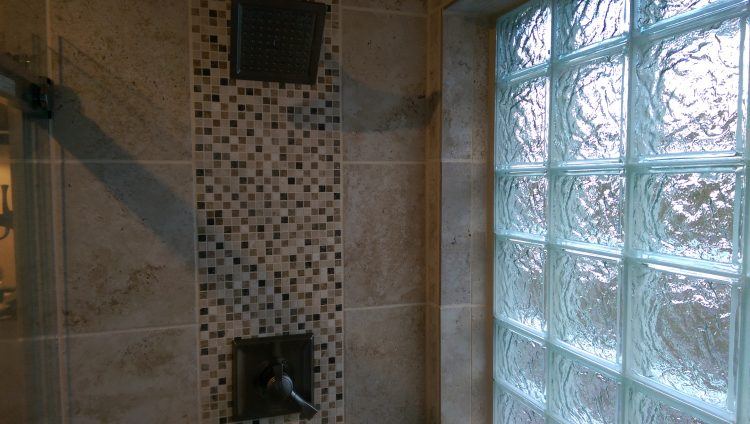 walk in shower with accent tile