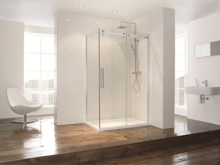 bathroom with hardwood flooring and glass shower