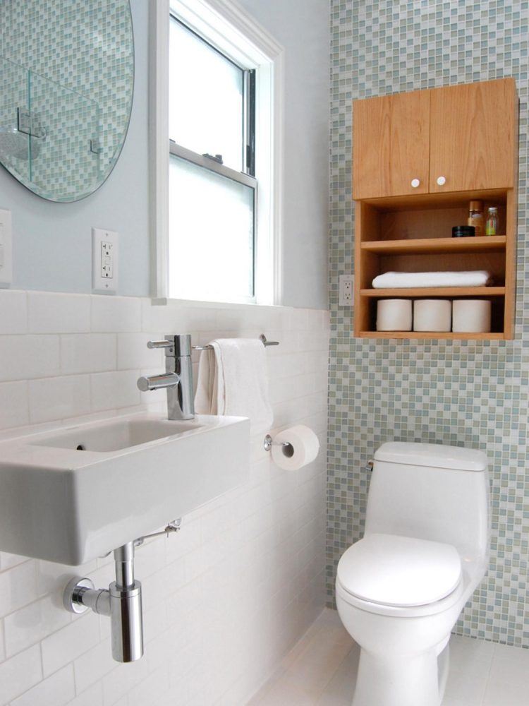 small bathroom with floating wooden cabinet