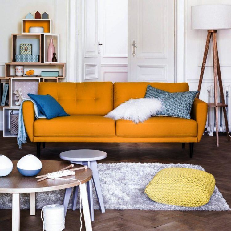 small living room with orange couch