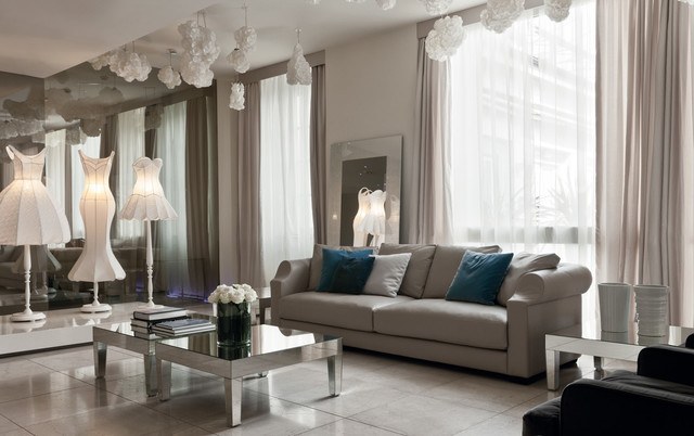 contemporary living room with mirrored coffee table