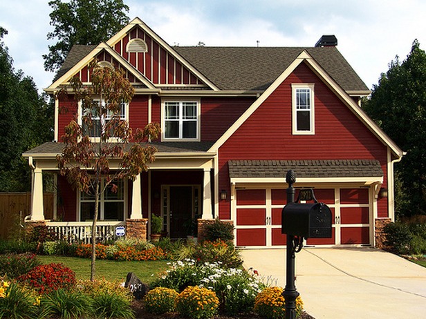 dark red house with white trim