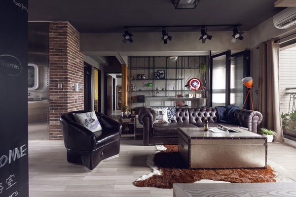 living room with black leather furniture