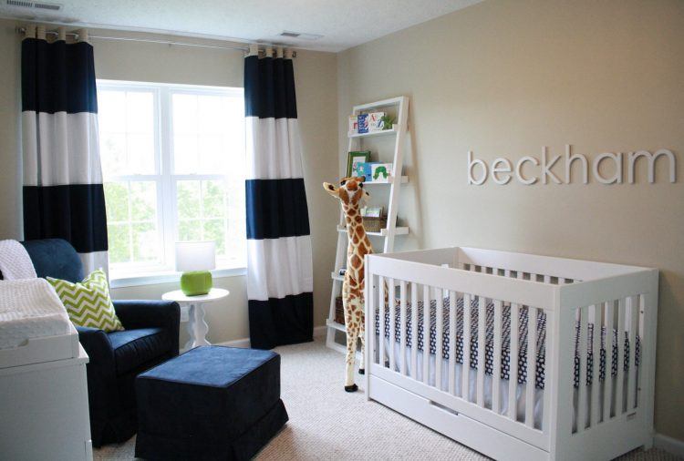 nursery with white crib and curtains