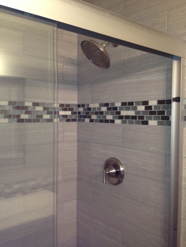 gorgeous bathroom with accent tile in shower